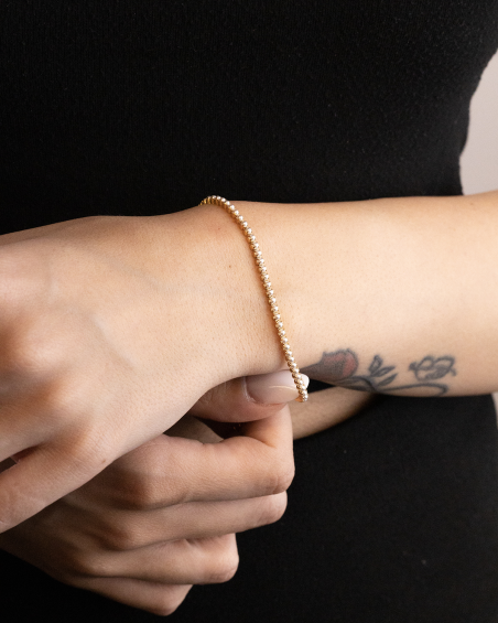 VERGOLDETES TENNISARMBAND MIT CABOCHON-PERLEN